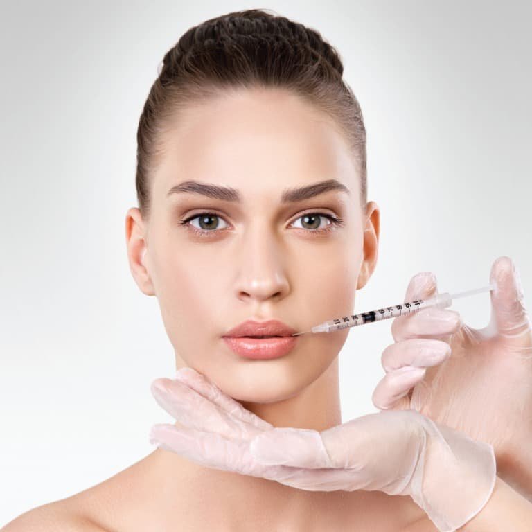 A Woman With A Scalpel In Her Mouth.