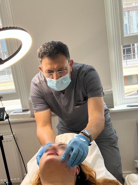 Dr SNA Performing PRP Treatment For Face In London