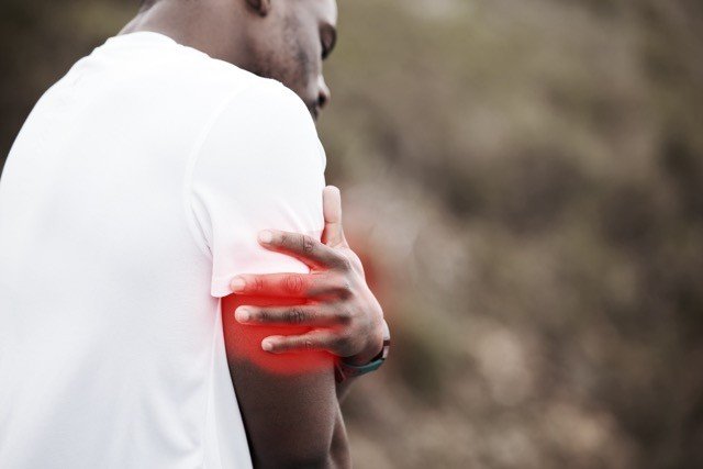 Arm, joint pain and man with fitness injury, health and wellness with red overlay, medical emergenc.