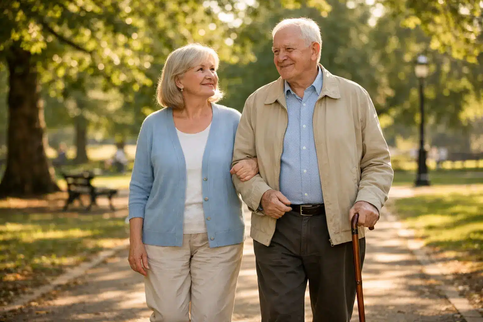 How to Treat Knee Pain in the Elderly Elderly Couple Walking in Park Guide by Dr SNA Clinic London (2)