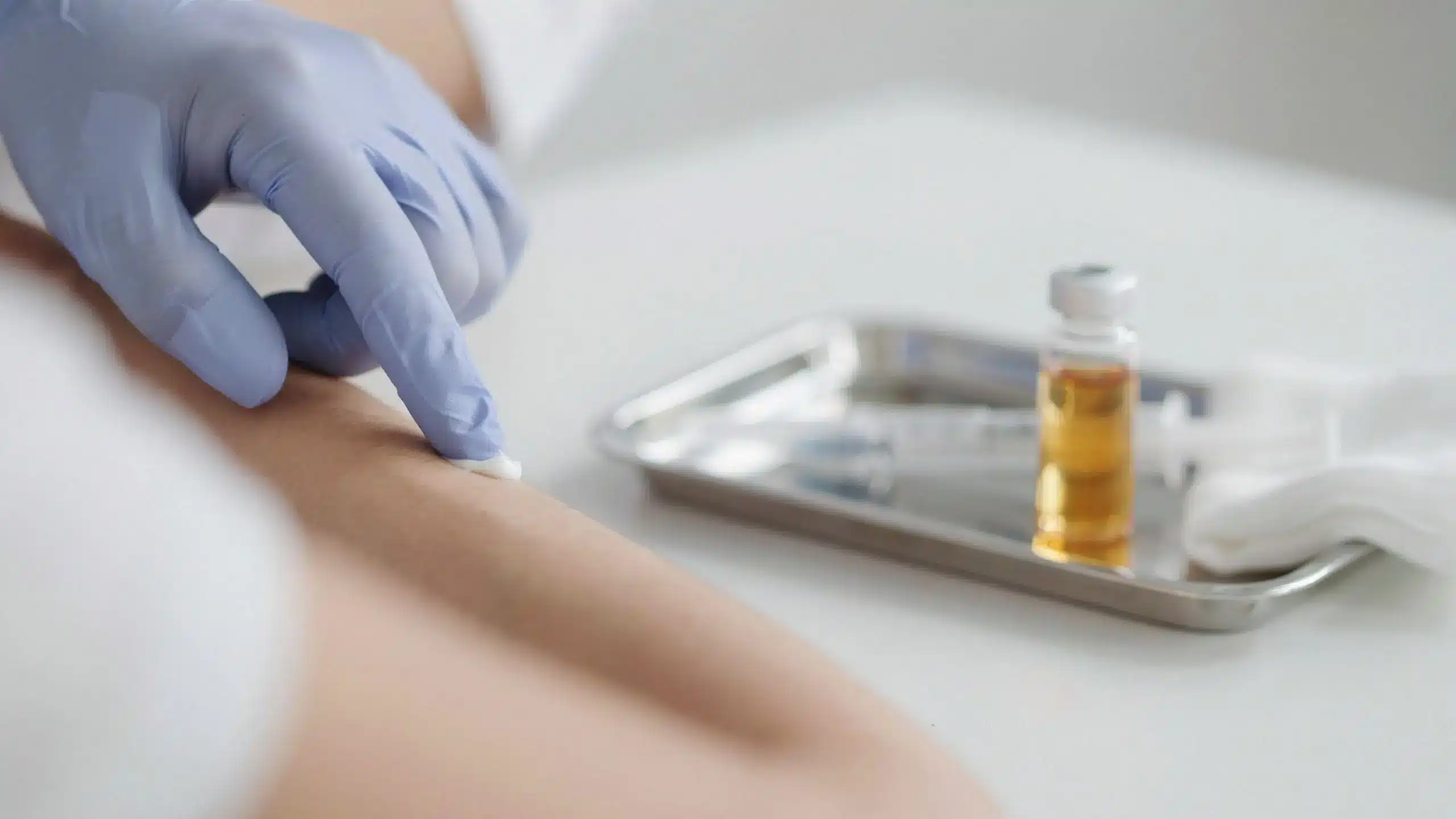Doctor preparing PRP injection for P Shot lichen sclerosus treatment showing platelet rich plasma therapy at Dr SNA Clinic London Wimpole Street